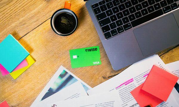 Wise card with coffee and laptop